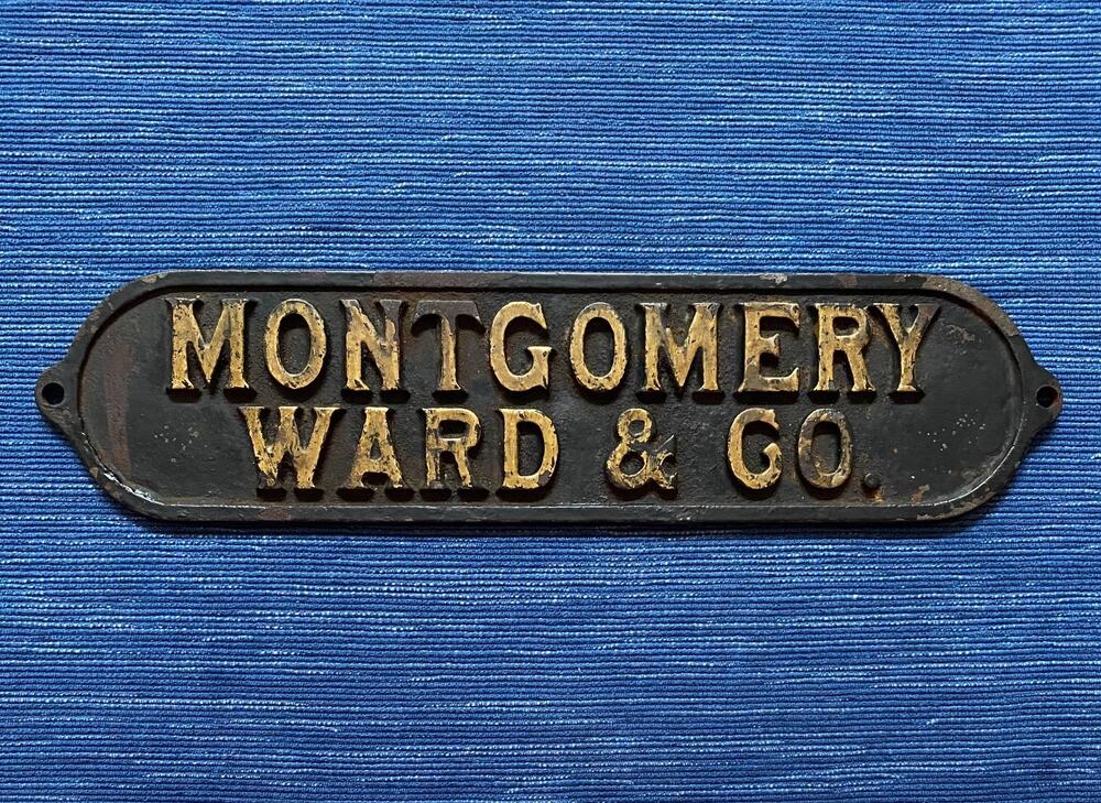 Vintage 11" Montgomery Ward & Co Cast Iron Plate Plaque Advertising Sign 98B